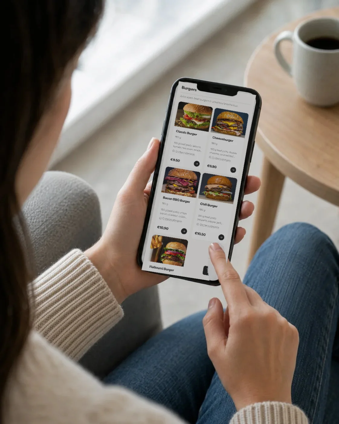 A customer browsing a restaurant menu on a phone